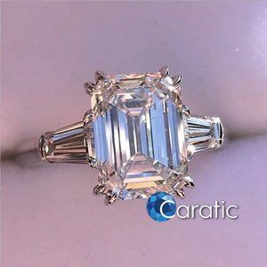 Double Prongs White Emerald Cut Three Stone Ring